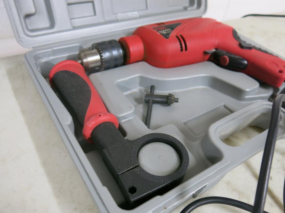 Power Devil Hammer Drill, Model PDD3021C. Comes with Carry Case.