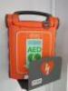 Cardiac Science AED Defibrillator with Wall Bracket & Spare Pad.