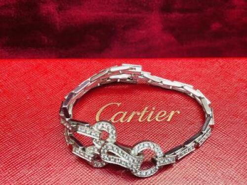 Cartier Agrafe 18ct White Gold & Diamond Encrusted Bracelet in Presentation Box, S/N 864921. Comes with Cartier Certificates 707002, 28th September 2007, S/N 864321 & Certificate 2261443, 27th December 2001.