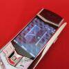 Vertu Signature S Mobile Phone (New/Unused). Mother of Pearl Keypad, with White Alligator Back. Diamond Encrusted Pillow and Graded Diamond Toggle Stone (0.19cts, Colour G, Clarity VS2), S/N SX-0061**, IMEI 355711, Made 11.20126, Lifetimer 0000:01. Comes - 10