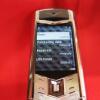 Vertu Signature S Mobile Phone (New/Unused). Mother of Pearl Keypad, with White Alligator Back. Diamond Encrusted Pillow and Graded Diamond Toggle Stone (0.19cts, Colour G, Clarity VS2), S/N SX-0061**, IMEI 355711, Made 11.20126, Lifetimer 0000:01. Comes - 4