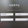 Vertu Signature S Mobile Phone. Stainless Steel with Studded Leather Back with Ceramic Pillow & Keypad, S/N S-0101**, IMEI 355711, Made 02.2010, Lifetimer 0180:24. Comes with Black Leather Signature S Phone Case (Used), 2 Batteries, Partial Sales Pack, Ch - 13