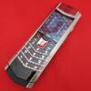 Vertu Signature S Mobile Phone. Stainless Steel with Diamond Encrusted Pillow and Black Leather Back. S/N S-0033**, IMEI - 355711, Made 10.2015, Lifetimer 0047:42. Comes with 2 Batteries, UK Charging Adaptor, Lead & Car Charge USB Adaptor.