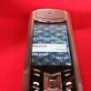 Vertu Signature S Mobile Phone. Stainless Steel with Diamond Encrusted Pillow and Black Leather Back. S/N S-0033**, IMEI - 355711, Made 10.2015, Lifetimer 0047:42. Comes with 2 Batteries, UK Charging Adaptor, Lead & Car Charge USB Adaptor. - 11