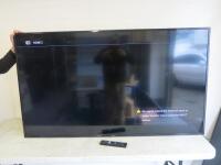 Sony 65" Ultra HD TV, Model KD-65X7052. Comes with Remote.