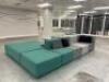 Large Multi-Coloured 9 Section Breakout Fabric Sofa in Greys & Greens with Assorted Cushions. Overall Size H75 x W380 x D245cm.