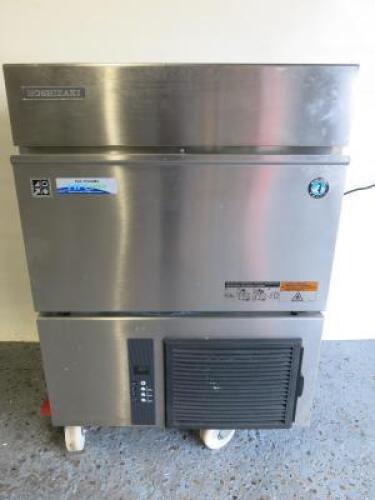 Hoshizaki Ice Machine, Model IM65NE, S/N H01037J, Size H84 x W63 x D50cm.