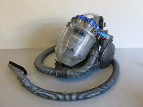 Dyson Stowaway Vacuum Cleaner, Model DC20. Comes with Hose.