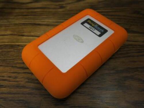 Lacie Rugged 4TB External HDD with Neil Poulton Design Orange Rubber Protector, Model LRD0TU7.