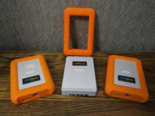 3 x Lacie Rugged Mini 1TB External HD's with Neil Poulton Design Orange Rubber Protector.