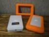 2 x Lacie Rugged Mini External HD's (658MB & 500GB) with Neil Poulton Design Orange Rubber Protector.