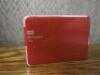 WD My Passport Ultra 2TB External HD in Red.