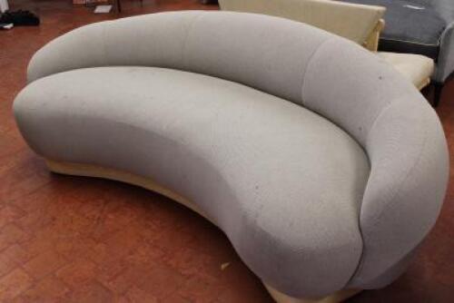 Large Curved Grey Material Sofa on Wood Base. Size 210cm wide.