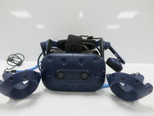 VIVE Virtual Reality Pro Headset with 2 Hand Controls & Leads ( As Viewed/Pictured).