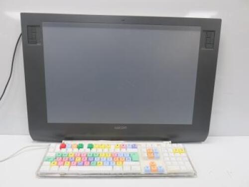 Wacom Intuos3 Tablet, Model PTZ-1231W, S/N 8FW000112 with Apple Pro Keyboard, Model M7803.