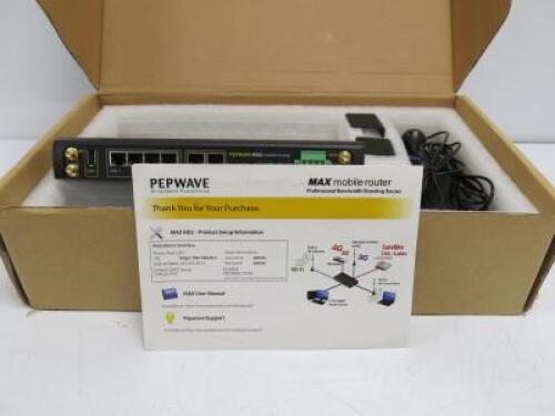 PEPWAVE MAX Mobile Router, Model MAX HD2, S/N 2830-A758-5330. Comes in Original Box with GPS Antenna, Cellular Antenna & Wi-Fi Antenna with Power Supply.