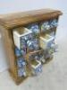 New/Boxed Namaste Spice Chest in Mango Wood with 16 Blue & Green Ceramic Drawers. Size H35 x W33 x D11cm. - 3