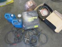 Quantity of Assorted Welding Consumables & Spares to Include: 3 x Rolls of Welding Wire, 2 x Tubs of Wqelding Anti Spatter, Earth Cables, Xcel Welding Gun (As Viewed/Pictured).