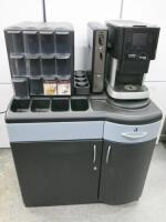 Mars Drinks Coffee Vending Machine, Model Flavia Creation 500. Comes with Brita Purity C50 QUELL ST Filter, Coin Attachment, Cup Dispenser, 12 Draw Condiment Stand & Waste Stand/Counter.