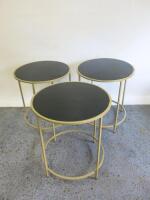 3 x Gold Coloured Metal Side Tables with Black Glass Tops. Size H55 x Dia 50cm.