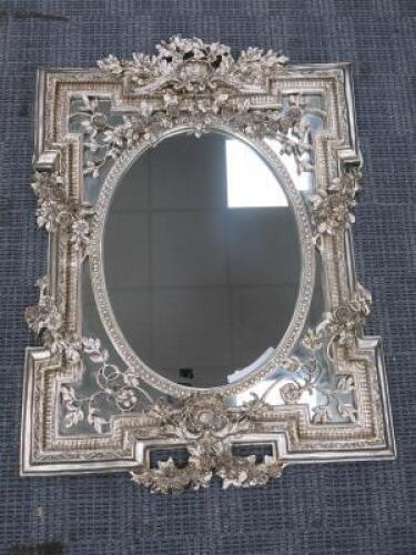 Large Ornate Silver Oval Bevel Edged Mirror with Rose Detail. Size H135 x W102cm.