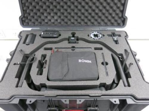 DJI Ronin 2 Professional 3 Axis Compact Lightweight Hand Held Camera Stabilization System to Include: 1 x Gimbal, 1 x Remote Control Model R2-TX1, 4 x Batteries, 1 x Charger, 1 x Motion Block, 1 x Grip, 1 x Quad charging Hub, 1 x Dual TB50 Battery Mount, 