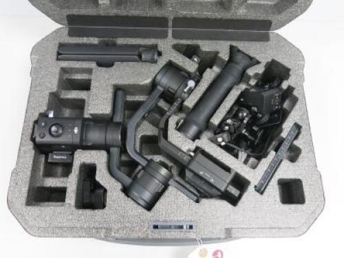 DJI Ronin-S Professional 3 Axis Hand Held Camera Stabilization System to Include: 1 x Gimbal, Model RS1, 1 x Command Unit, 1 x Quick Release Plate, 1 x Focus Wheel, 1 x Switch Grip Mount, 1 x Tripod. Comes in Polystyrene Case.