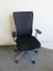 Kokuyo Swivel Office Chair in Black with Mesh Back.