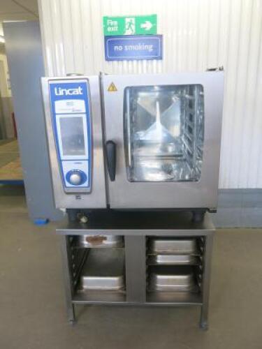 Lincat 6 Rack Self Cooking Centre with 5 Senses, System Rational, Model OSC WE 61, 2011, S/N E61SH16052517349. Size H145 x W87x D80cm. Comes with S/S Stand & 6 GN Containers.