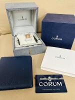 Corum 18Ct White Gold & Diamond Watch with Pink Face, Water Resistant, (25 x 40mm), White Alligator Strap, in Corum Presentation Box with documents including Corum International Warranty Booklet & Card and Service Receipt.