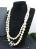 String of Chanel Pearls with 2 x Chanel Interlocking "C" with Clear Square Stones in Presentation Case. Approx. 110cm Total Length, 55cm Linked. - 2