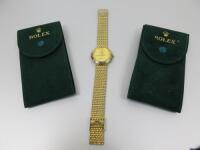 Rolex Geneve Sapphire Crystal Quartz Watch, Stainless Steel, Plated Gold and Two Rolex Suede Leather Pouches.