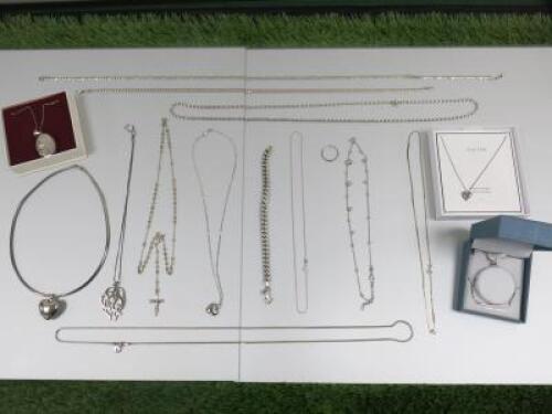 16 x Items of Assorted Silver 925 Jewellery to Include: 2 x Boxed Sterling Silver Necklaces, 2 x Silver Pendant Lockets, 6 x Plain Silver Necklaces, 4 x Other Silver Necklaces, 1 x Ring & 1 x Silver Bracelet. Weight 130 grams(As Viewed/Inspected).