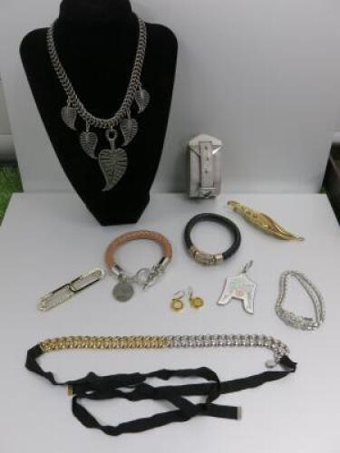 10 x Items of Designer Jewellery to Include: 1 x Channel Curtain Key Ring, 1 x Pair of Michael Kors Ear Rings, 1 x Marc Jacobs Neck Lace, 1 x Buddha To Buddha Bracelet, 2 x Reiss Bracelets, 1 x Pierre Balmain Paris Broach , 1 x Mazer Bros Bracelet, 1 x Pi