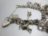 Silver Hallmarked Charm Bracelet with 13 Charms. - 4