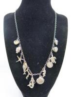Van Peterson Silver Charm Necklace with 12 Charms.
