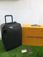 Louis Vuitton Damier Graphite Coated Canvas & Black Calfskin Pegase 55. Comes with Protective Cover, Box & Appears Unused. Comes with Selfridges Manchester Receipt.