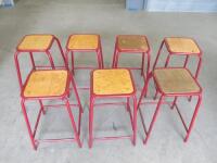 7 x Red Tubular Stacking Stools with Ply Seat.