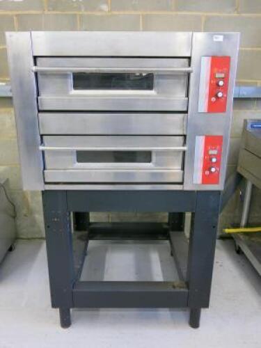 Stainless Steel Double Deck Electric Pizza Oven, Single Phase on Purpose Built Stand. Size H68 x W95 X D88cm. NOTE: Condition as viewed & inspected.