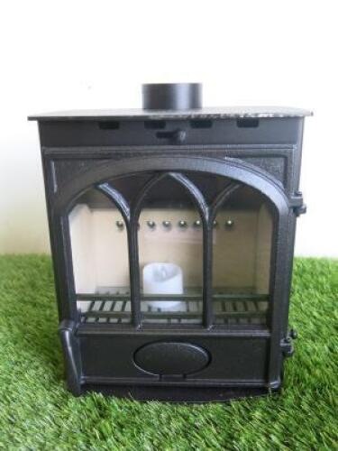 Mini Cast Log Burning Stove (used as samples for Carlton & Jenrick). Size H22cm.