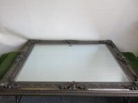 Large Ornamental Bevelled Mirror in Antique Silver Style Frame. Size 154 x 122cm.