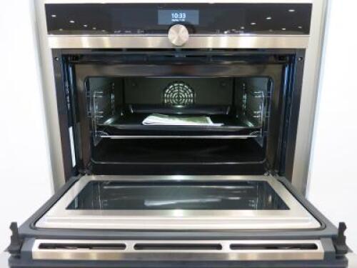 Siemens Integrated Compact Oven with Microwave, Model CM656GBS1B/05, S/N 950900094, Size H45 x W60 x D55cm. Comes with Instruction Manual. Ex Display.