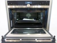 Siemens Integrated Compact Oven with Microwave, Model CM656GBS1B/05, S/N 950900094, Size H45 x W60 x D55cm. Comes with Instruction Manual. Ex Display.