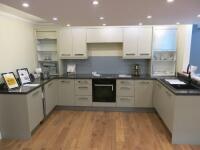 Ex-Display U Shape Kitchen Laminate Slab Door in Mussel & Dakar Colour to Consist of Worktops, Glass Splashback, Base Units, Wall Units, Cupboards & Plinths to Include: Approx. 3.07M, 1.55M, 1.42M Run of Axiom Laminate Worktops & Upstands, 2.4m Glass Spla