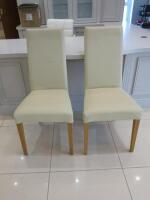 Pair of Cream Faux Leather Dining Chairs.