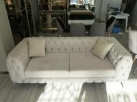 Cream Velour 3 Seat, 2 Cushion Chesterfield Style Sofa, with Silver Legs. Size 76 x 225 x 100cm.