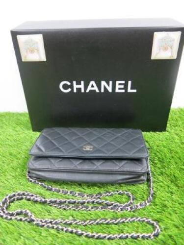 Chanel Black Leather Wallet on Chain Shoulder Bag. Serial Number 16735524. Comes with Box.