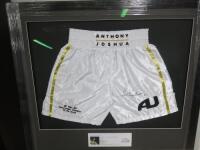 Framed & Glazed Anthony Joshua Signed White Shorts, Date 05/2017, with Certificate of Authenticity. Size H83 x W94cm.