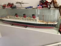 Model of Cunard White Star Line RMS Queen Mary Cruise Liner in Glass Display Case. Size of Model 210cm, Glass Case 225 x 33 x 59cm. NOTE: case requires minor repairs.