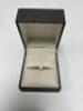 Diamond Solitaire, Estimated .50 carat set in White Metal (Believed to be Platinum) Ring Size I/J  in Presentation Box.